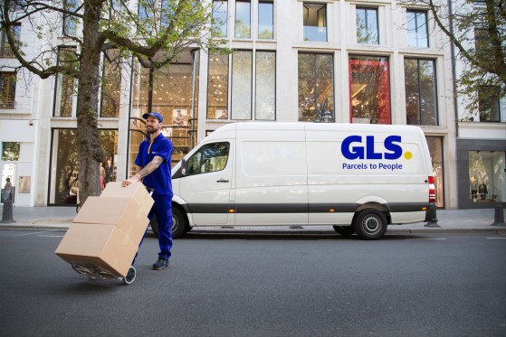 GLS van drives away after a delivery at the Atomium