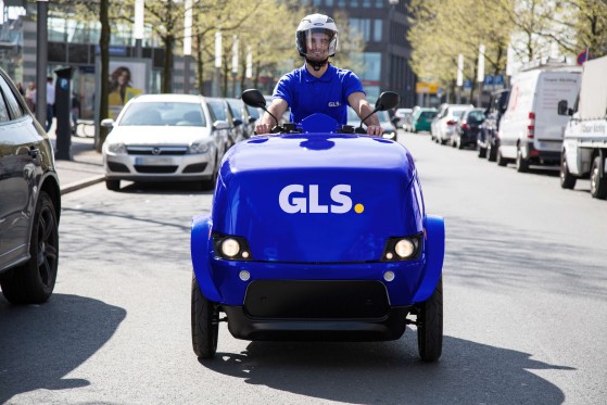 GLS driver out for delivery with his van