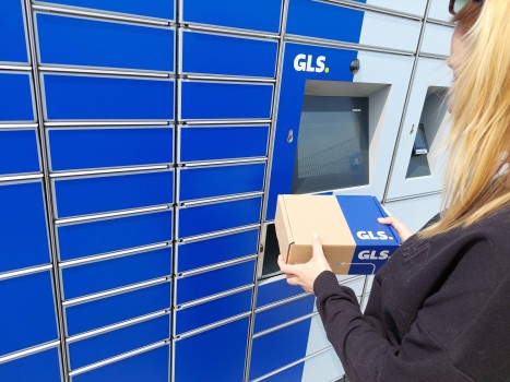 GLS customer collecting a parcel from a GLS locker