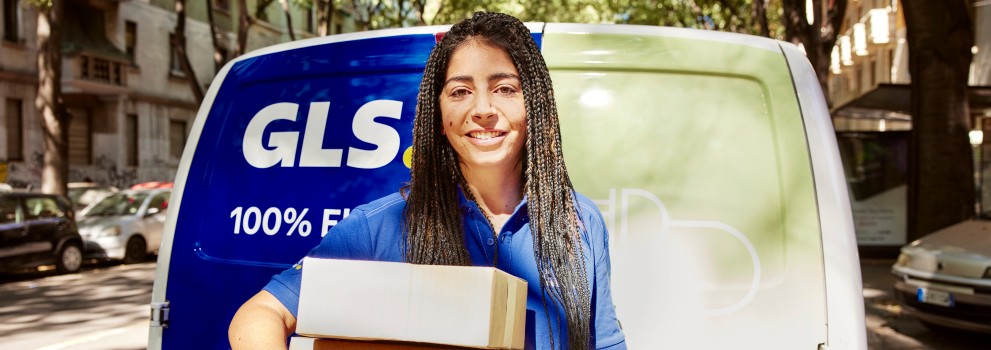 GLS driver woman with a parcel on her arms