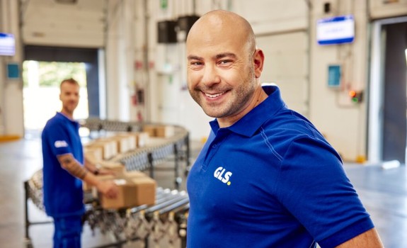 GLS driver smiling at the camera